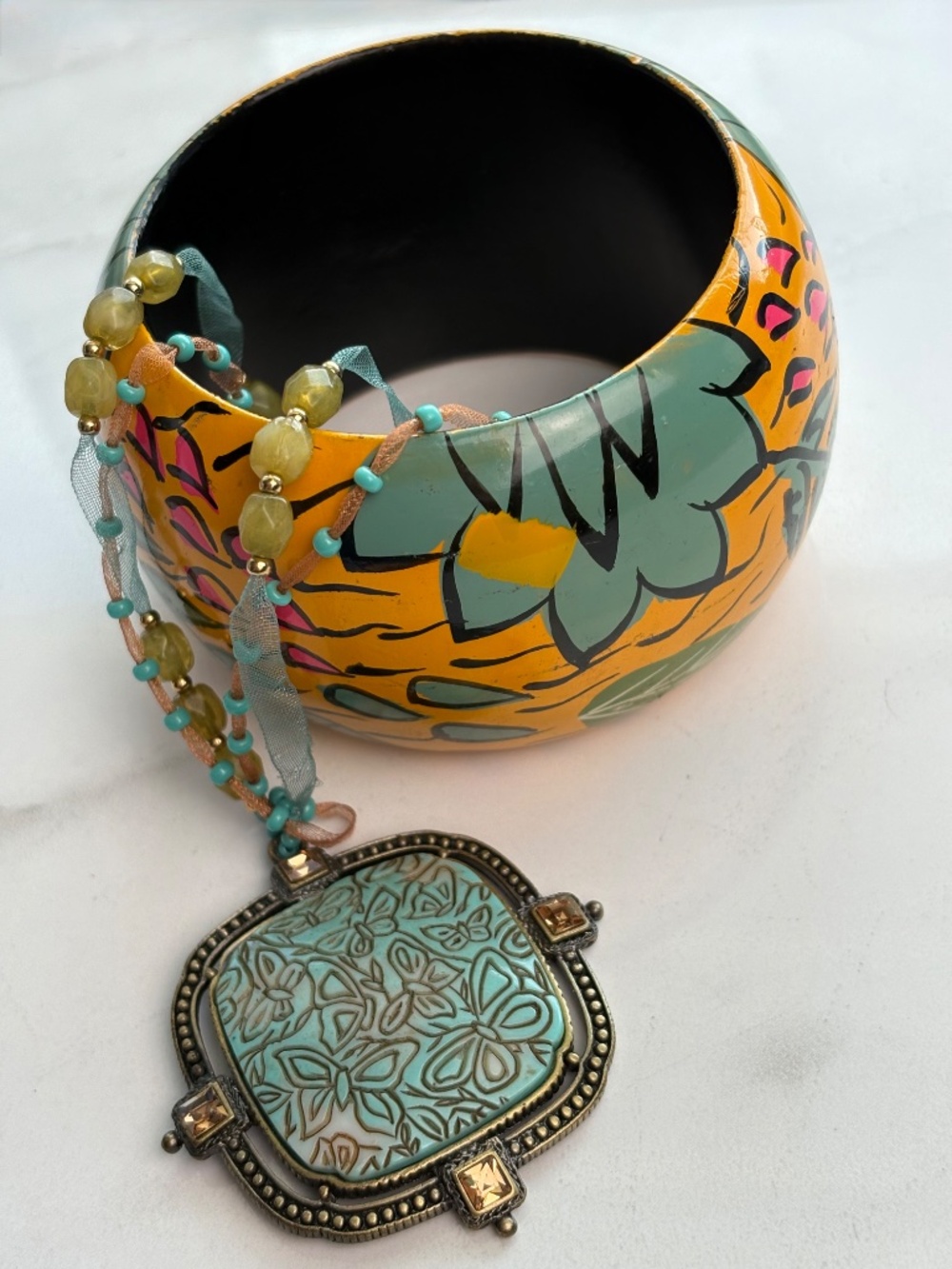 Monet Beautiful Bohemian Ceramic Butterfly Pendant Necklace in Brass Tone